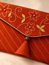 Close-up of hand embroidery on the Gerua Khadi shagun envelope