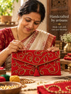 Artisan hand embroidering the Lehar Khadi shagun envelope