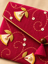 Close-up of hand embroidery on the Rani Khadi shagun envelope