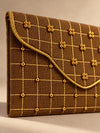 Close-up of hand embroidery on the Sunehri Khadi shagun envelope